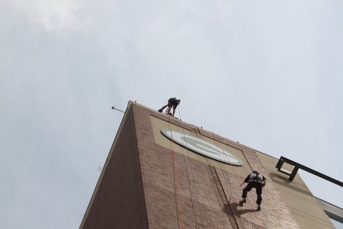 Charli rappels down Lambeau... yep that's her up top