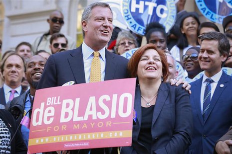 New York City Democratic mayoral nominee Bill de Blasio (L) embraces former mayoral candidate and City Council Speaker Christine Quinn durin New York City Democratic mayoral nominee Bill de Blasio (L) embraces former mayoral candidate and City Council Speaker Christine Quinn durin