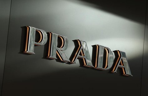 Sunlight is reflected on a Prada logo outside its store at Hong Kong's shopping Tsim Sha Tsui district September 16, 2013, one day before th Sunlight is reflected on a Prada logo outside its store at Hong Kong's shopping Tsim Sha Tsui district September 16, 2013, one day before th