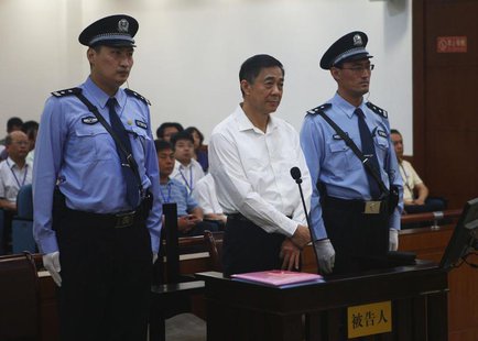Disgraced Chinese politician Bo Xilai stands trial inside the court in Jinan, Shandong province August 22, 2013, in this photo released by J Disgraced Chinese politician Bo Xilai stands trial inside the court in Jinan, Shandong province August 22, 2013, in this photo released by J