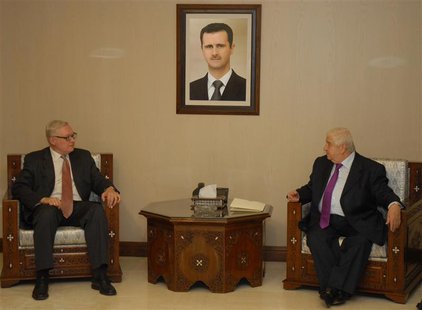 Syrian Foreign Minister Walid al-Muallem (R) meets Russian deputy Foreign Minister, Sergei Ryabkov,in Damascus,in this handout photograph di Syrian Foreign Minister Walid al-Muallem (R) meets Russian deputy Foreign Minister, Sergei Ryabkov,in Damascus,in this handout photograph di