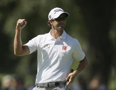 Australia's Adam Scott reacts after his birdie on the first hole during the third round of the 2013 PGA Championship golf tournament at Oak Australia's Adam Scott reacts after his birdie on the first hole during the third round of the 2013 PGA Championship golf tournament at Oak