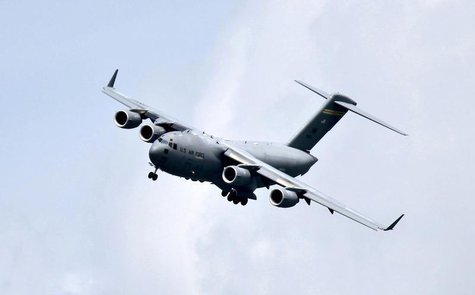 A Boeing C-17 Globemaster III military transport aircraft of the United States Air Force (USAF) performs a fly-by during the Singapore Airsh A Boeing C-17 Globemaster III military transport aircraft of the United States Air Force (USAF) performs a fly-by during the Singapore Airsh