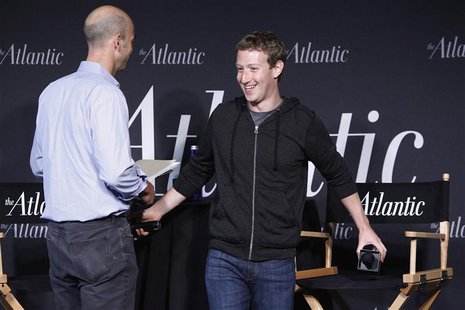 Facebook CEO Mark Zuckerberg (R) takes his seat for an onstage interview for with James Bennet (L) of the Atlantic Magazine in Washington, S Facebook CEO Mark Zuckerberg (R) takes his seat for an onstage interview for with James Bennet (L) of the Atlantic Magazine in Washington, S