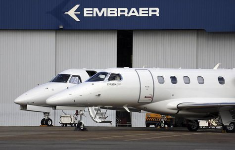 Private jets are seen at the Embraer headquarters in Sao Jose dos Campos, 100 km (62 miles) from Sao Paulo May 14, 2013. REUTERS/Nacho Doce Private jets are seen at the Embraer headquarters in Sao Jose dos Campos, 100 km (62 miles) from Sao Paulo May 14, 2013. REUTERS/Nacho Doce