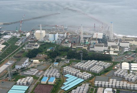 An aerial view shows Tokyo Electric Power Co. (TEPCO)'s tsunami-crippled Fukushima Daiichi nuclear power plant and its contaminated water st An aerial view shows Tokyo Electric Power Co. (TEPCO)'s tsunami-crippled Fukushima Daiichi nuclear power plant and its contaminated water st