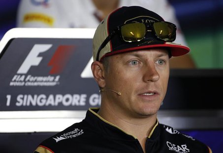 Lotus Formula One driver Kimi Raikkonen of Finland speaks during a news conference ahead of the Singapore F1 Grand Prix September 19, 2013. Lotus Formula One driver Kimi Raikkonen of Finland speaks during a news conference ahead of the Singapore F1 Grand Prix September 19, 2013.