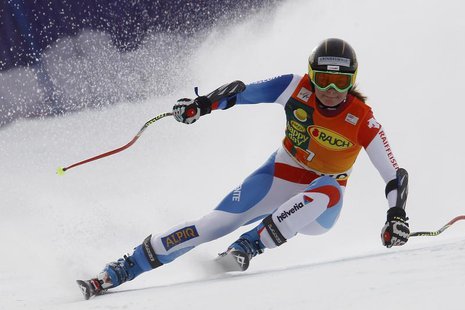 Martina Schild of Switzerland clears a gate during the women's Alpine Skiing World Cup Super G race in Bansko February 26, 2012. REUTERS/Dom Martina Schild of Switzerland clears a gate during the women's Alpine Skiing World Cup Super G race in Bansko February 26, 2012. REUTERS/Dom