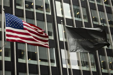 A U.S. and JPMorgan flag fly in front of the headquarters of JPMorgan Chase & Co bank in New York, March 15, 2013. REUTERS/Lucas Jackson A U.S. and JPMorgan flag fly in front of the headquarters of JPMorgan Chase & Co bank in New York, March 15, 2013. REUTERS/Lucas Jackson