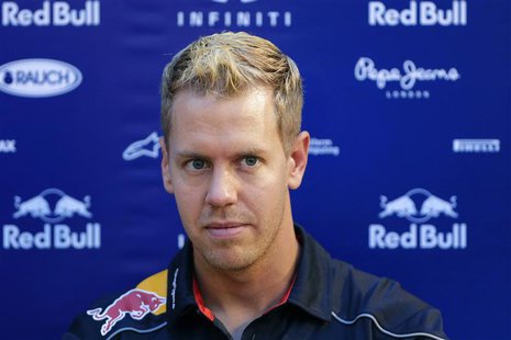 Red Bull Formula One driver Sebastian Vettel of Germany listens to a question during a news conference at the paddock ahead of the Singapore Red Bull Formula One driver Sebastian Vettel of Germany listens to a question during a news conference at the paddock ahead of the Singapore
