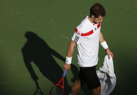 Andy Murray of Britain pauses during a break in play against Stanislas Wawrinka of Switzerland at the U.S. Open tennis championships in New Andy Murray of Britain pauses during a break in play against Stanislas Wawrinka of Switzerland at the U.S. Open tennis championships in New