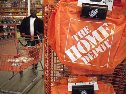 A customer wheels a cart through a Home Depot store in Washington February 20, 2012. REUTERS/Jonathan Ernst A customer wheels a cart through a Home Depot store in Washington February 20, 2012. REUTERS/Jonathan Ernst