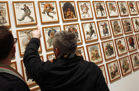 Visitors view a wall of Saturday Evening Post magazine covers featuring the art of Norman Rockwell at the Dulwich Picture Gallery in London Visitors view a wall of Saturday Evening Post magazine covers featuring the art of Norman Rockwell at the Dulwich Picture Gallery in London