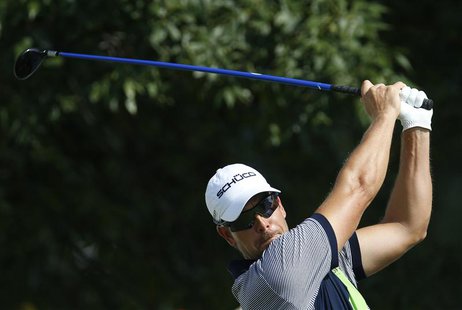 Henrik Stenson of Sweden hits from the 10th tee during the first round of the BMW Championship golf tournament at the Conway Farms Golf Club Henrik Stenson of Sweden hits from the 10th tee during the first round of the BMW Championship golf tournament at the Conway Farms Golf Club