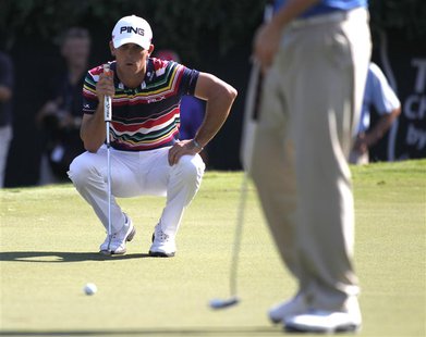 Billy Horschel of U.S. lines up his putt on the 18th green during the first round of the Tour Championship golf tournament at East Lake Golf Billy Horschel of U.S. lines up his putt on the 18th green during the first round of the Tour Championship golf tournament at East Lake Golf
