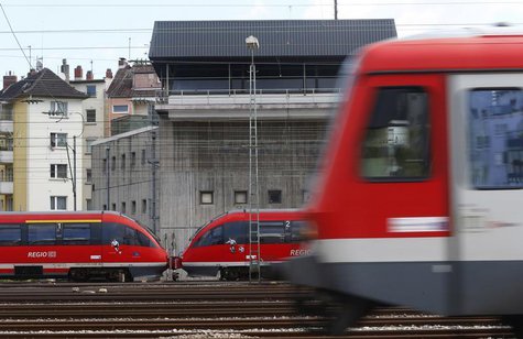 Trains drive past the signal tower of the Deutsche Bahn at the main train station in Mainz August 13, 2013. REUTERS/Ralph Orlowski Trains drive past the signal tower of the Deutsche Bahn at the main train station in Mainz August 13, 2013. REUTERS/Ralph Orlowski