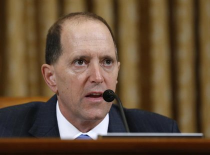 U.S. House Ways and Means Committee Chairman Dave Camp (R-MI) questions outgoing acting IRS Commissioner Steven Miller during a hearing on t U.S. House Ways and Means Committee Chairman Dave Camp (R-MI) questions outgoing acting IRS Commissioner Steven Miller during a hearing on t