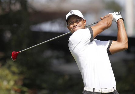 Tiger Woods of the U.S. drives off the fourth tee during round two of the Tour Championship golf tournament at East Lake Golf Club in Atlant Tiger Woods of the U.S. drives off the fourth tee during round two of the Tour Championship golf tournament at East Lake Golf Club in Atlant