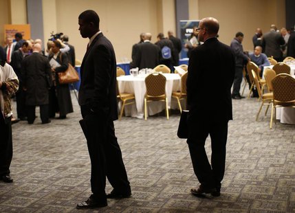 Job seekers stand in a room of prospective employers at a career fair in New York City, October 24, 2012. REUTERS/Mike Segar Job seekers stand in a room of prospective employers at a career fair in New York City, October 24, 2012. REUTERS/Mike Segar