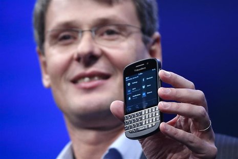 Research in Motion (RIM) President and Chief Executive Officer Thorsten Heins introduces a new RIM Blackberry 10 device during the launch in Research in Motion (RIM) President and Chief Executive Officer Thorsten Heins introduces a new RIM Blackberry 10 device during the launch in