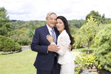 George Soros and Tamiko Bolton are shown as they prepare to attend the reception at Museum of Modern Art (MOMA) in this handout photo releas George Soros and Tamiko Bolton are shown as they prepare to attend the reception at Museum of Modern Art (MOMA) in this handout photo releas