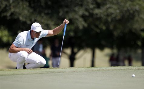 Henrik Stenson of Sweden lines up his putt on the first hole during the second round of the Tour Championship golf tournament at East Lake G Henrik Stenson of Sweden lines up his putt on the first hole during the second round of the Tour Championship golf tournament at East Lake G