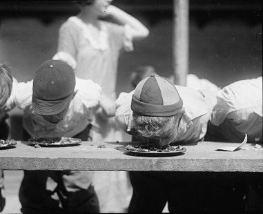 Competitive Eating (Photo by: Wikimedia Commons). Competitive Eating (Photo by: Wikimedia Commons).