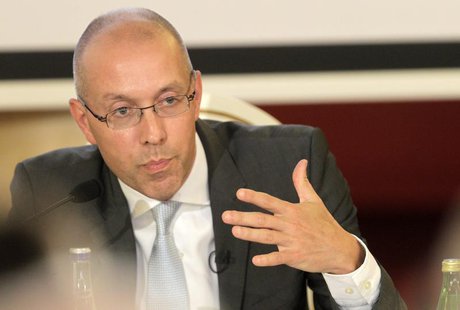European Central Bank (ECB) executive board member Joerg Asmussen gestures as he speaks the debate "European Economic Integration: Challenge European Central Bank (ECB) executive board member Joerg Asmussen gestures as he speaks the debate "European Economic Integration: Challenge