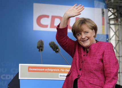German Chancellor and conservative Christian Democratic Union (CDU) leader Angela Merkel waves to supporters during a CDU election campaign German Chancellor and conservative Christian Democratic Union (CDU) leader Angela Merkel waves to supporters during a CDU election campaign