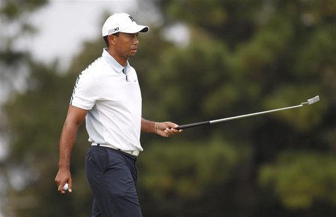 Tiger Woods of the U.S. walks off the green on the eighth hole during the third round of the Tour Championship golf tournament at East Lake Tiger Woods of the U.S. walks off the green on the eighth hole during the third round of the Tour Championship golf tournament at East Lake