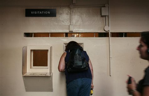 Visitors view the visitation area at Alcatraz Island in San Francisco Bay in San Francisco, California, August 9, 2009. REUTERS/Robert Galbr Visitors view the visitation area at Alcatraz Island in San Francisco Bay in San Francisco, California, August 9, 2009. REUTERS/Robert Galbr