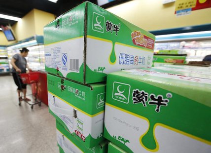 Boxes of Mengniu's milk products are seen at a supermarket in Beijing June 19, 2013. REUTERS/Kim Kyung-Hoon Boxes of Mengniu's milk products are seen at a supermarket in Beijing June 19, 2013. REUTERS/Kim Kyung-Hoon