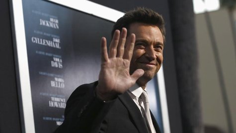 Cast member Hugh Jackman waves at the premiere of his film "Prisoners" at the Academy of Motion Picture Arts and Sciences in Beverly Hills, Cast member Hugh Jackman waves at the premiere of his film "Prisoners" at the Academy of Motion Picture Arts and Sciences in Beverly Hills,