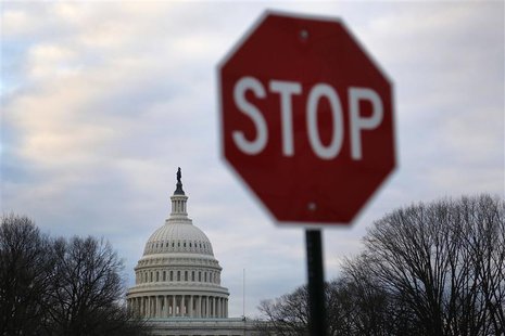 A traffic sign is seen near the U.S. Capitol building in Washington March 1, 2013. REUTERS/Jonathan Ernst A traffic sign is seen near the U.S. Capitol building in Washington March 1, 2013. REUTERS/Jonathan Ernst