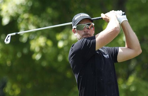 Henrik Stenson of Sweden hits off the second tee in the final round of the Tour Championship golf tournament at East Lake Golf Club in Atlan Henrik Stenson of Sweden hits off the second tee in the final round of the Tour Championship golf tournament at East Lake Golf Club in Atlan