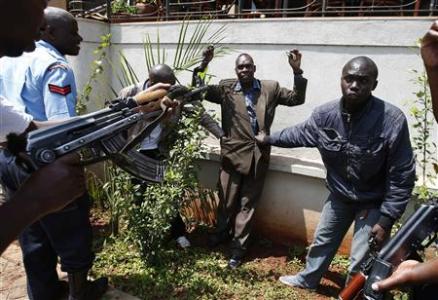 Policemen search a man for weapons as he walked out of Westgate Shopping Centre in Nairobi September 21, 2013. (Credit: Reuters/Goran Tomasevic)
Policemen search a man for weapons as he walked out of Westgate Shopping Centre in Nairobi September 21, 2013. (Credit: Reuters/Goran Tomasevic)