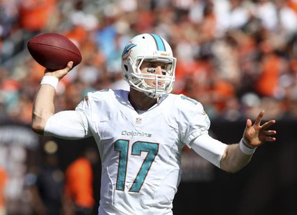 Miami Dolphins quarterback Ryan Tannehill throws a pass during the fourth quarter of their NFL football game against the Cleveland Browns in Miami Dolphins quarterback Ryan Tannehill throws a pass during the fourth quarter of their NFL football game against the Cleveland Browns in