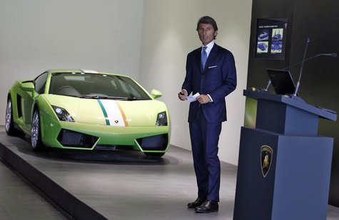 Stephan Winkelmann, CEO of Lamborghini, speaks with the media next to a Lamborghini Gallardo LP 550 during an opening ceremony of a new deal Stephan Winkelmann, CEO of Lamborghini, speaks with the media next to a Lamborghini Gallardo LP 550 during an opening ceremony of a new deal