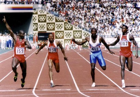 Ben Johnson of Canada (L) leads Calvin Smith of the U.S. (2nd L), Linford Christie of Britain (2nd R) and Carl Lewis of the U.S. (R) across Ben Johnson of Canada (L) leads Calvin Smith of the U.S. (2nd L), Linford Christie of Britain (2nd R) and Carl Lewis of the U.S. (R) across