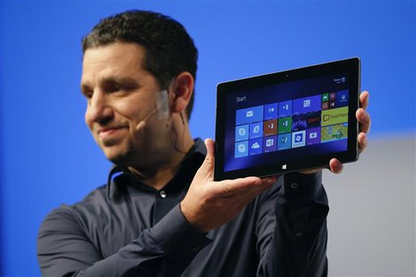 Panos Panay, Microsoft Surface general manager, holds up the Microsoft Surface Pro 2 during the launch of their Surface 2 tablets in New Yor Panos Panay, Microsoft Surface general manager, holds up the Microsoft Surface Pro 2 during the launch of their Surface 2 tablets in New Yor