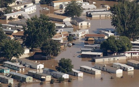 Mobile homes lie flooded in the of town of Evans, Weld County, Colorado in this September 17, 2013 file photo. REUTERS/Rick Wilking/Files Mobile homes lie flooded in the of town of Evans, Weld County, Colorado in this September 17, 2013 file photo. REUTERS/Rick Wilking/Files