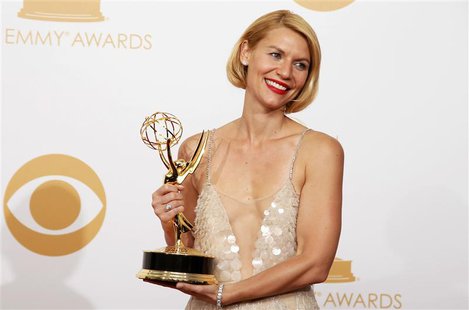 Actress Claire Danes from Showtime's series "Homeland" poses backstage with her award for Outstanding Lead Actress In A Drama Series at the Actress Claire Danes from Showtime's series "Homeland" poses backstage with her award for Outstanding Lead Actress In A Drama Series at the