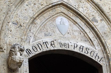 The Monte dei Paschi bank logo is seen on the main entrance of the bank's headquarters in Siena March 12, 2012. REUTERS/Max Rossi The Monte dei Paschi bank logo is seen on the main entrance of the bank's headquarters in Siena March 12, 2012. REUTERS/Max Rossi