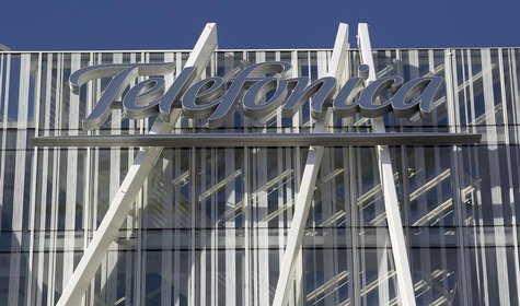 Telefonica's logo is seen on top of Telefonica's tower in Barcelona January 31, 2013. REUTERS/Albert Gea Telefonica's logo is seen on top of Telefonica's tower in Barcelona January 31, 2013. REUTERS/Albert Gea