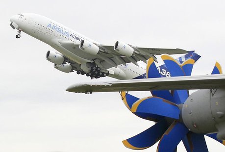 An Airbus A350 participates in a flying display during the 50th Paris Air Show at the Le Bourget airport near Paris, June 22, 2013. The Pari An Airbus A350 participates in a flying display during the 50th Paris Air Show at the Le Bourget airport near Paris, June 22, 2013. The Pari