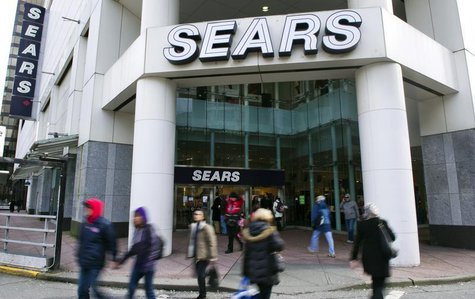 People walk past the main Sears store in downtown Vancouver, British Columbia February 23, 2011. Retailer Sears Canada Inc posted a 28 perce People walk past the main Sears store in downtown Vancouver, British Columbia February 23, 2011. Retailer Sears Canada Inc posted a 28 perce