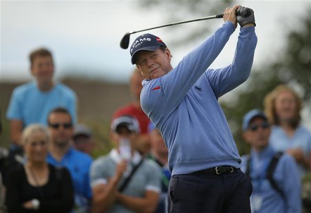 Tom Watson of the U.S. watches his tee shot on the second hole during the first round of the British Open golf Championship at Muirfield in Tom Watson of the U.S. watches his tee shot on the second hole during the first round of the British Open golf Championship at Muirfield in