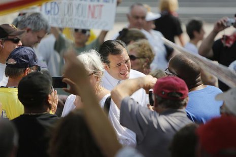 U.S. Senator Ted Cruz (R-TX) (C) greets attendees as he arrives to speak at the Tea Party Patriots 'Exempt America from Obamacare' rally on U.S. Senator Ted Cruz (R-TX) (C) greets attendees as he arrives to speak at the Tea Party Patriots 'Exempt America from Obamacare' rally on
