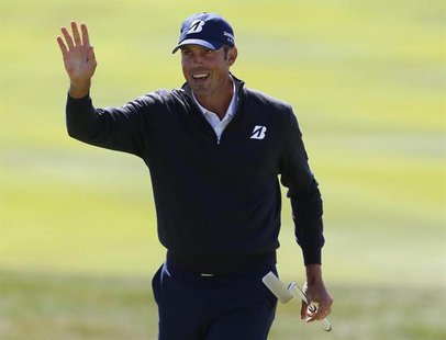Matt Kuchar of the U.S. acknowledges the crowd after finishing the third round of the BMW Championship golf tournament at the Conway Farms G Matt Kuchar of the U.S. acknowledges the crowd after finishing the third round of the BMW Championship golf tournament at the Conway Farms G