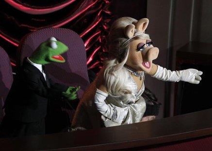 Muppet characters Miss Piggy and Kermit the Frog introduce a special performance by Cirque Du Soleil at the 84th Academy Awards in Hollywood Muppet characters Miss Piggy and Kermit the Frog introduce a special performance by Cirque Du Soleil at the 84th Academy Awards in Hollywood